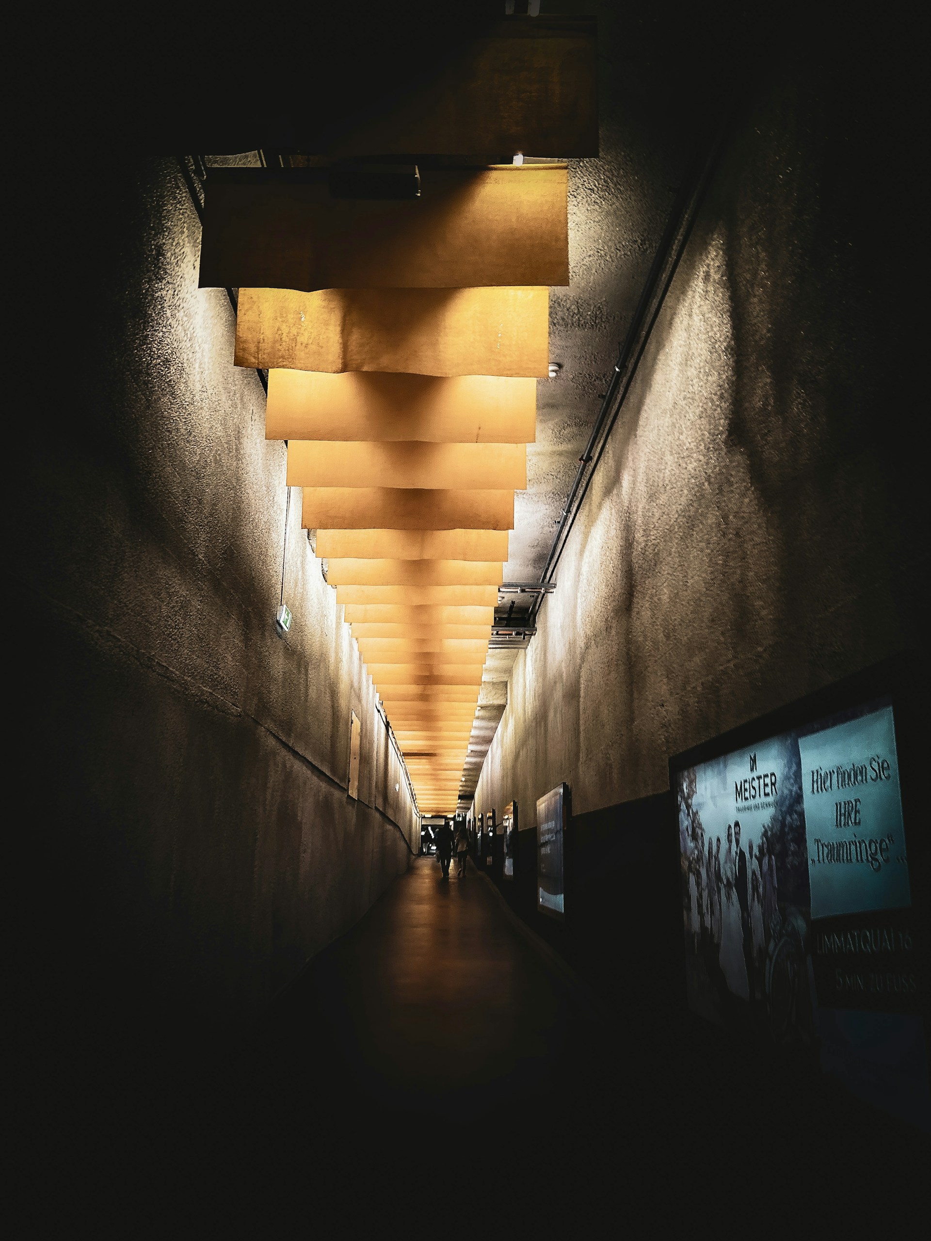 woman wearing yellow long-sleeved dress under white clouds and blue sky during daytime