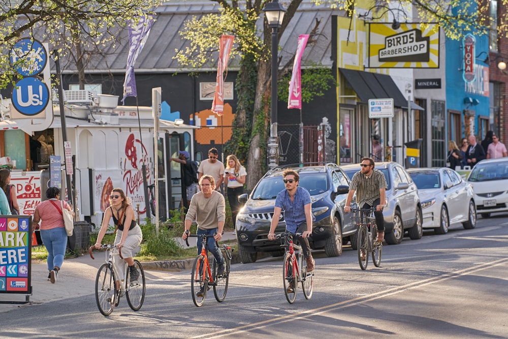 people riding bicycles on the street