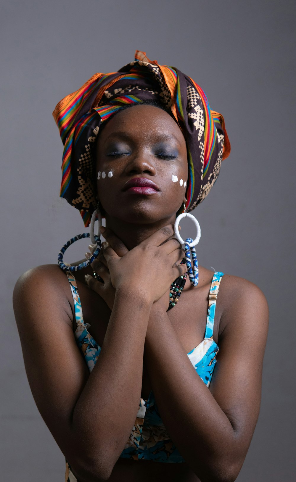 a woman wearing a headdress