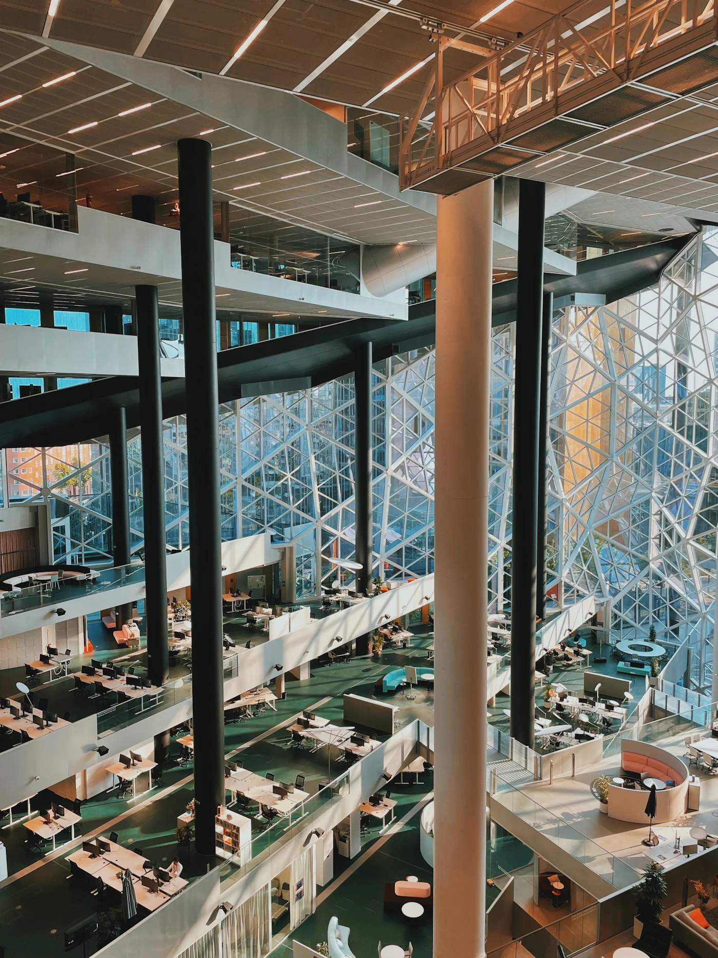 Multi-level contemporary office atrium with a precise structural grid