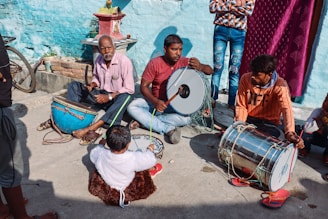 a group of people playing drums