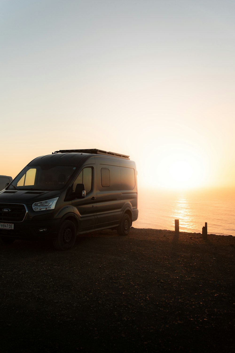 a van parked on a beach