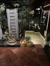 A tranquil temple scene with candles and flowers, symbolizing spiritual guidance and devotion.