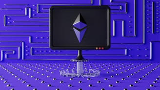 A dark computer screen displays a geometric shape resembling a logo, set against a futuristic blue wall with a maze-like pattern of raised lines and dots. The foreground features a base made of connected hexagons, adding to the high-tech aesthetic.