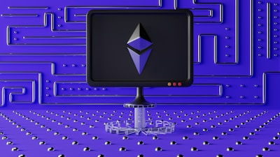 A dark computer screen displays a geometric shape resembling a logo, set against a futuristic blue wall with a maze-like pattern of raised lines and dots. The foreground features a base made of connected hexagons, adding to the high-tech aesthetic.