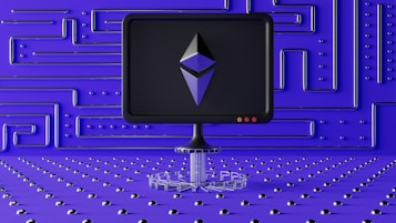 A dark computer screen displays a geometric shape resembling a logo, set against a futuristic blue wall with a maze-like pattern of raised lines and dots. The foreground features a base made of connected hexagons, adding to the high-tech aesthetic.