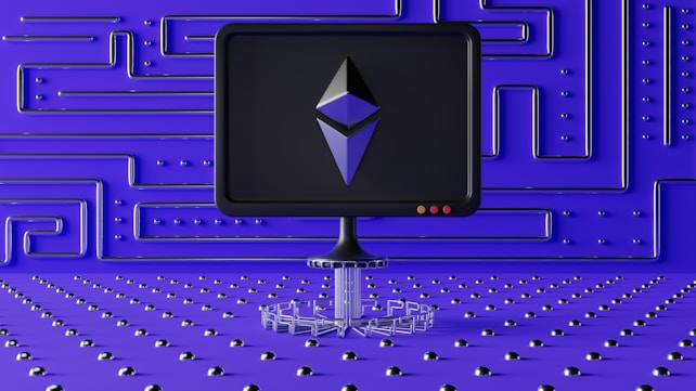 A dark computer screen displays a geometric shape resembling a logo, set against a futuristic blue wall with a maze-like pattern of raised lines and dots. The foreground features a base made of connected hexagons, adding to the high-tech aesthetic.