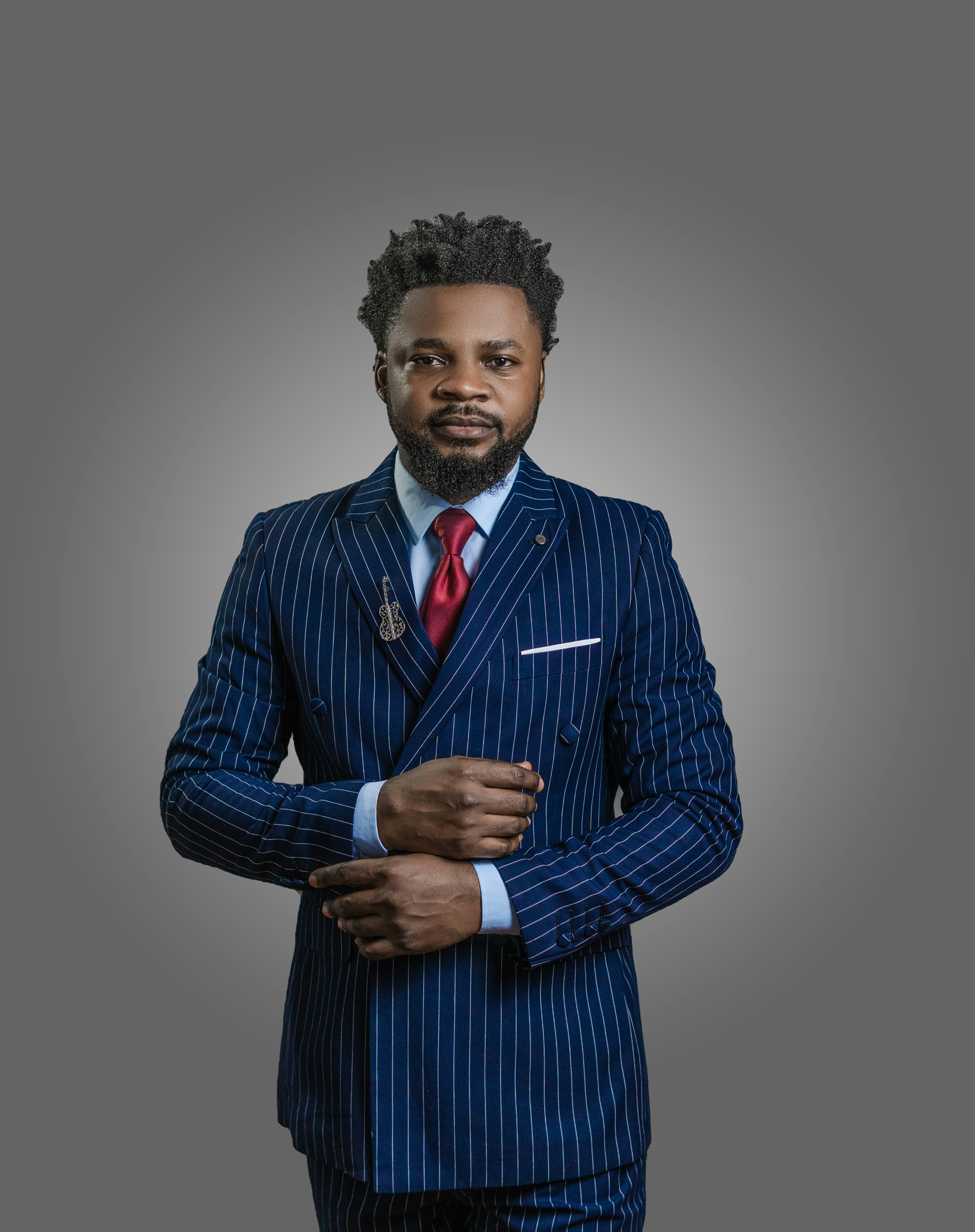 a man with his hands folded