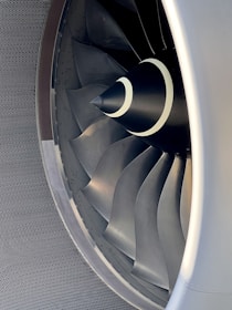 Close-up of precise welding on an axial fan blade, highlighting craftsmanship.