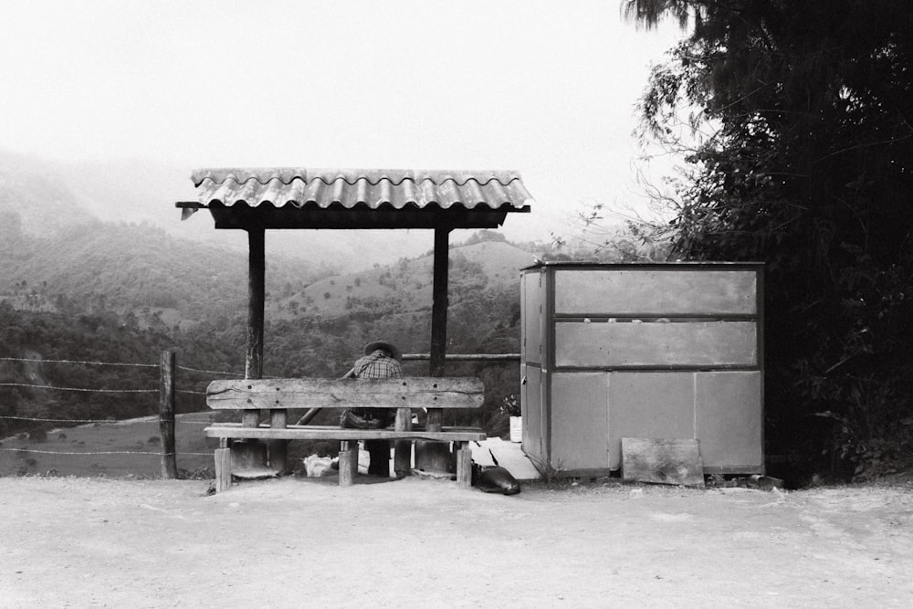 a person sitting on a bench