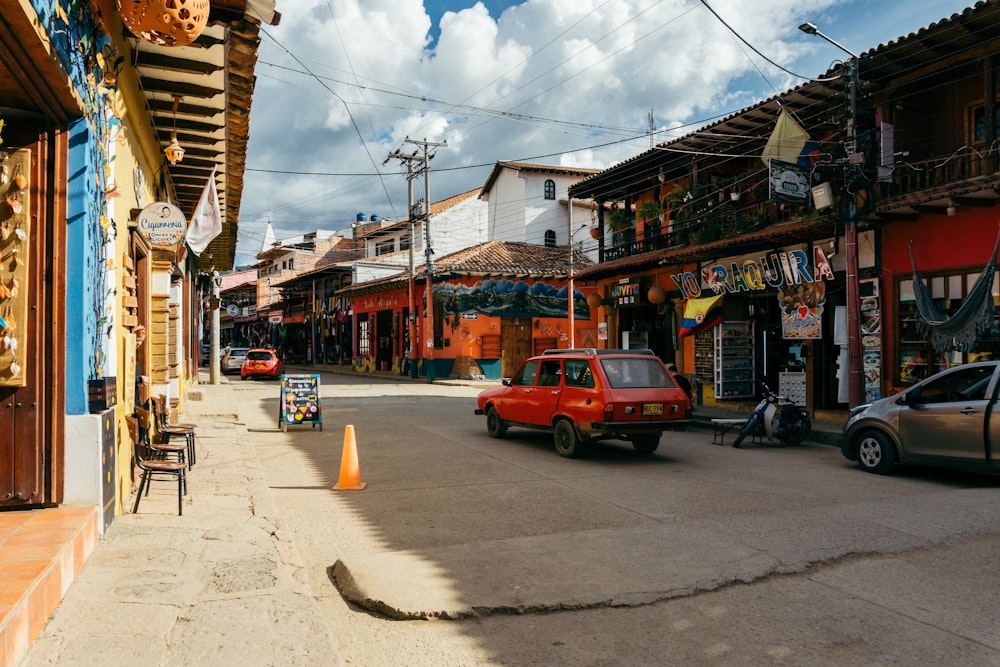 a street with cars and buildings on either side of it