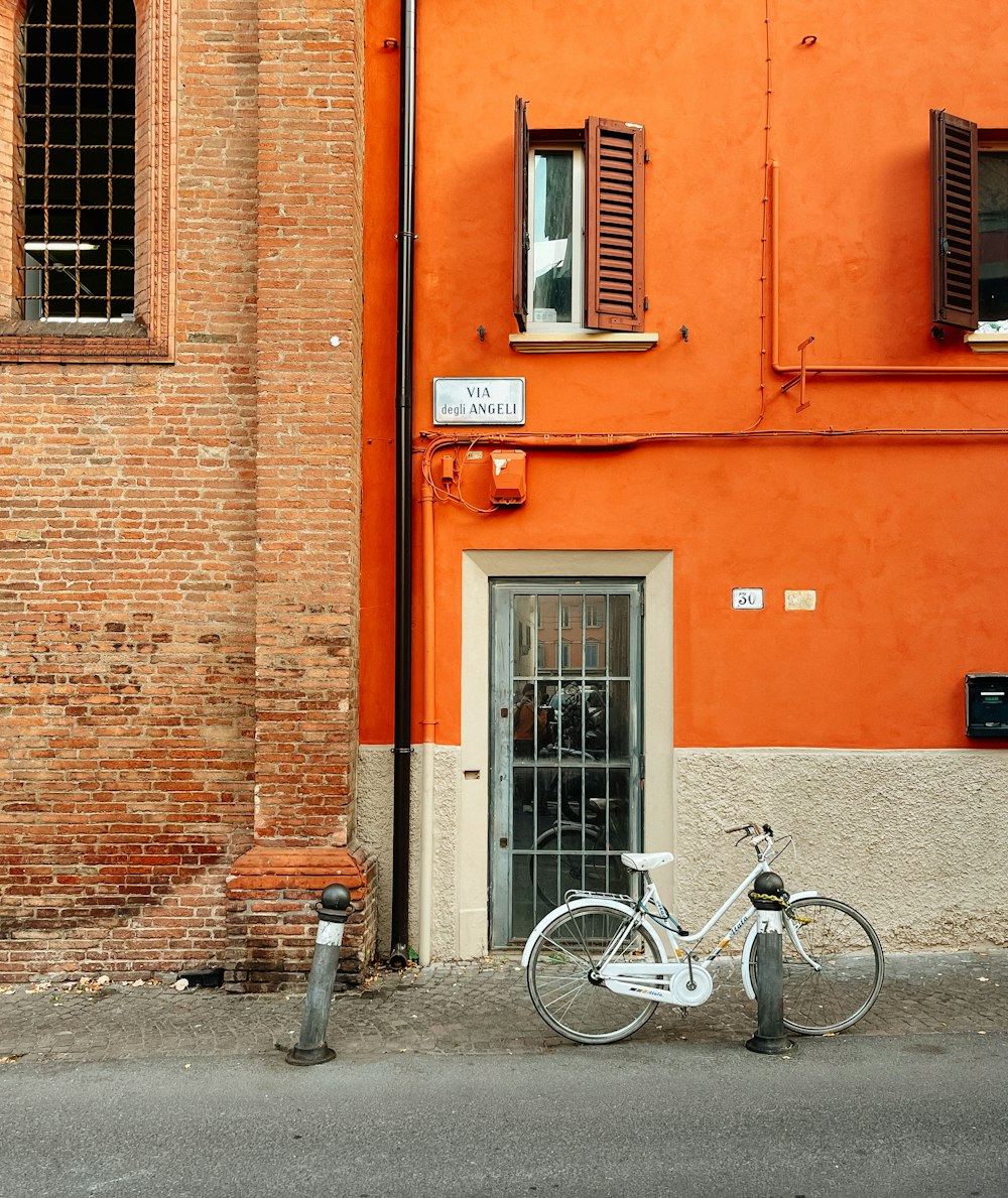 a bicycle parked in front of a building