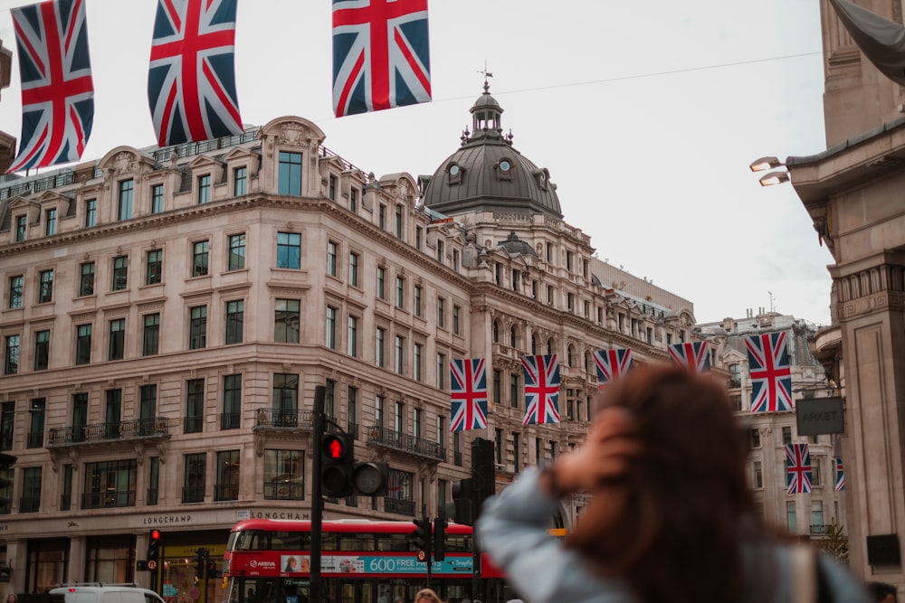 a group of flags on a building