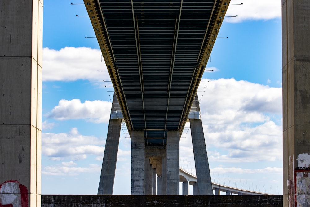 a large bridge with a large metal frame