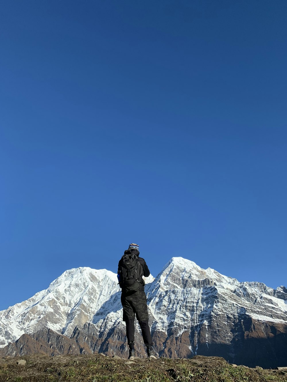 a person standing on a mountain