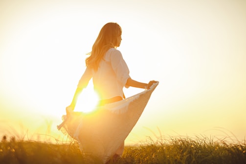 a person sitting in a field