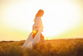 a person sitting in a field