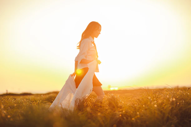a person sitting in a field