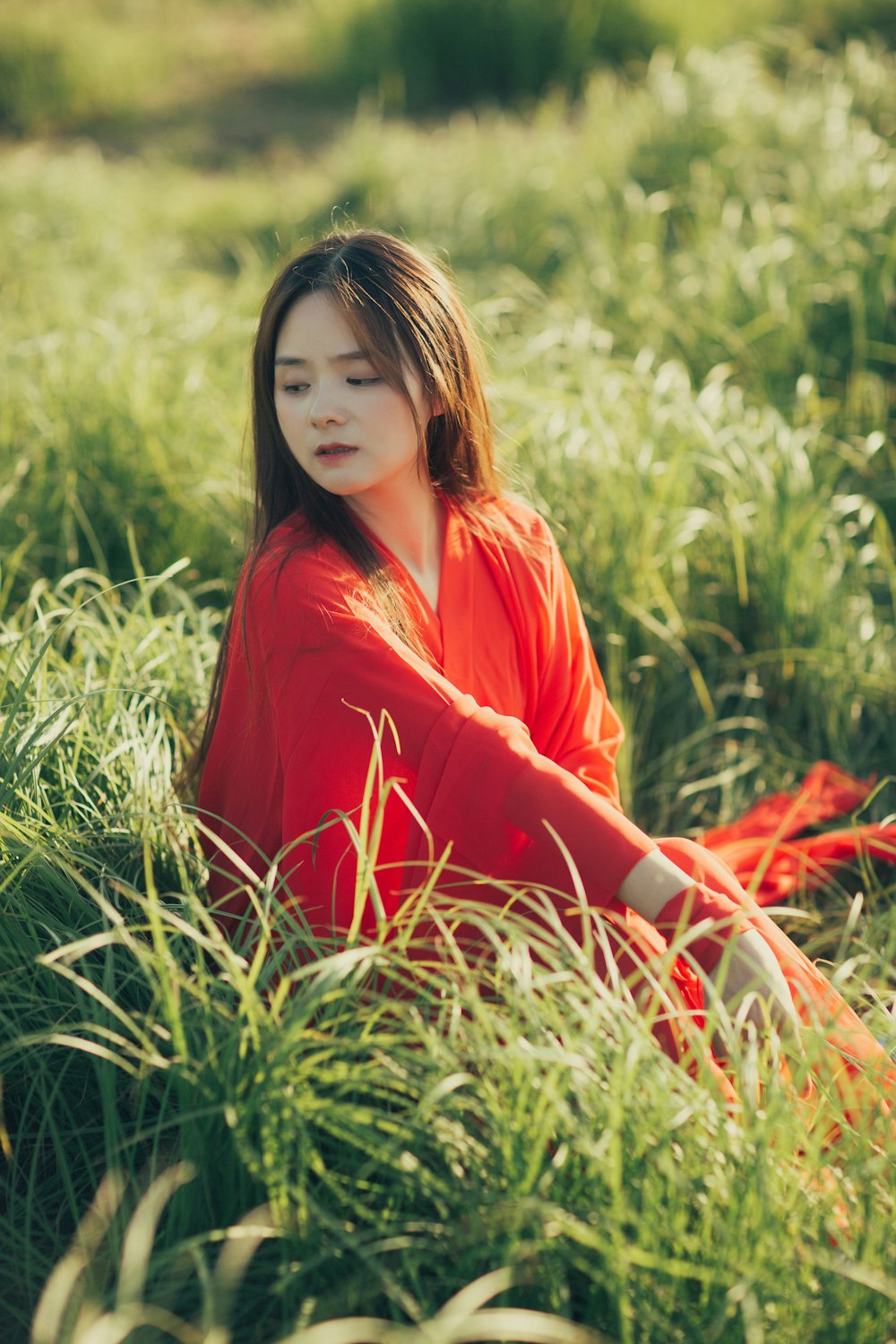 a person sitting in a field