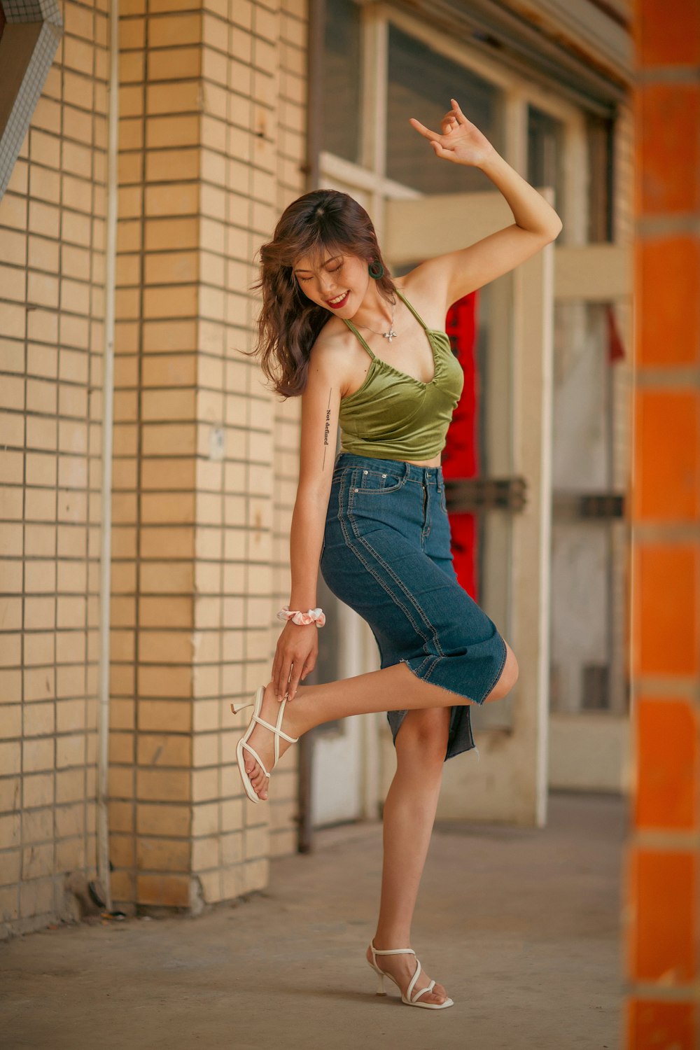 a woman in a green shirt