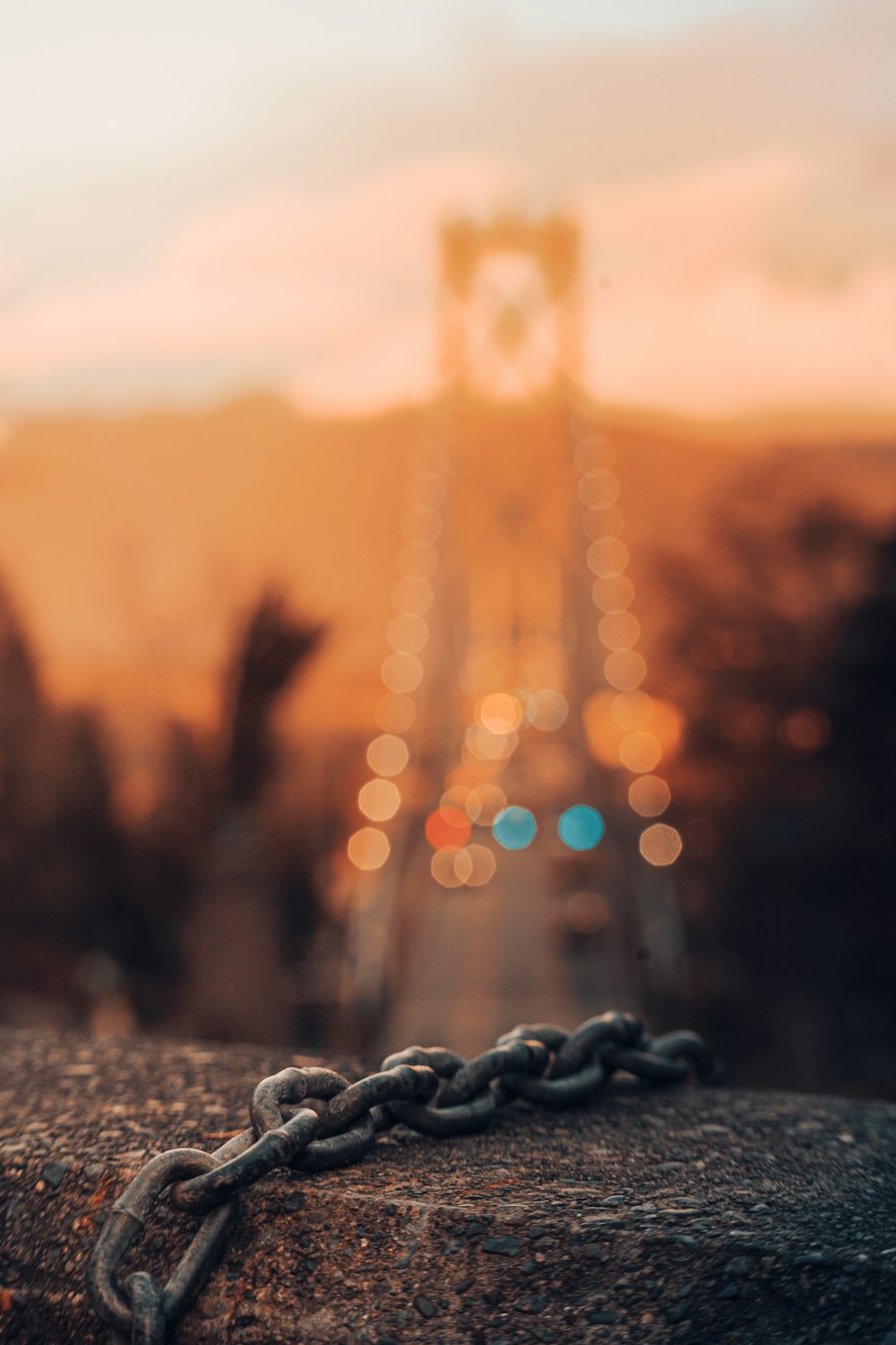 a chain link fence with a building in the background