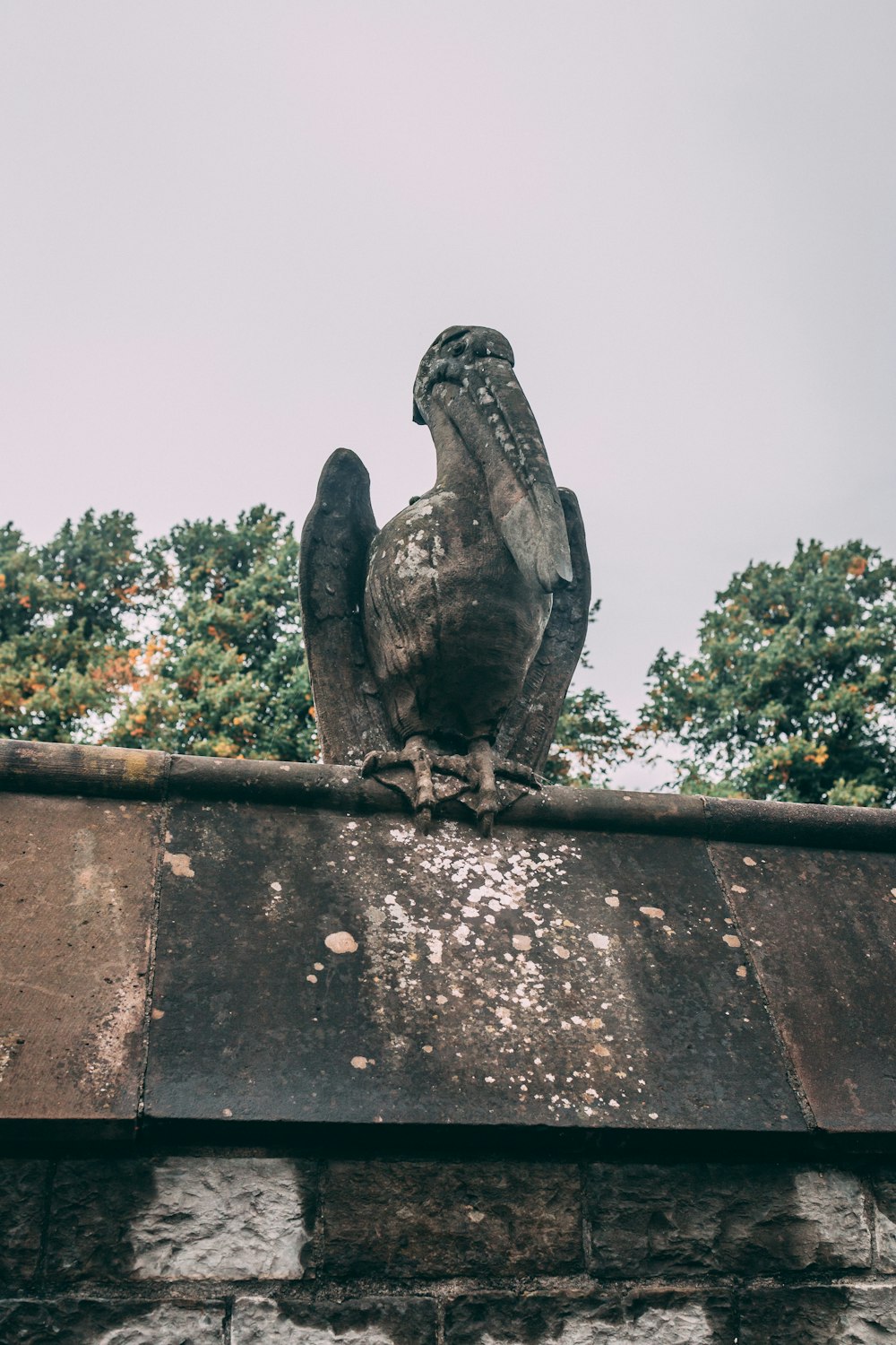 a statue on a wall