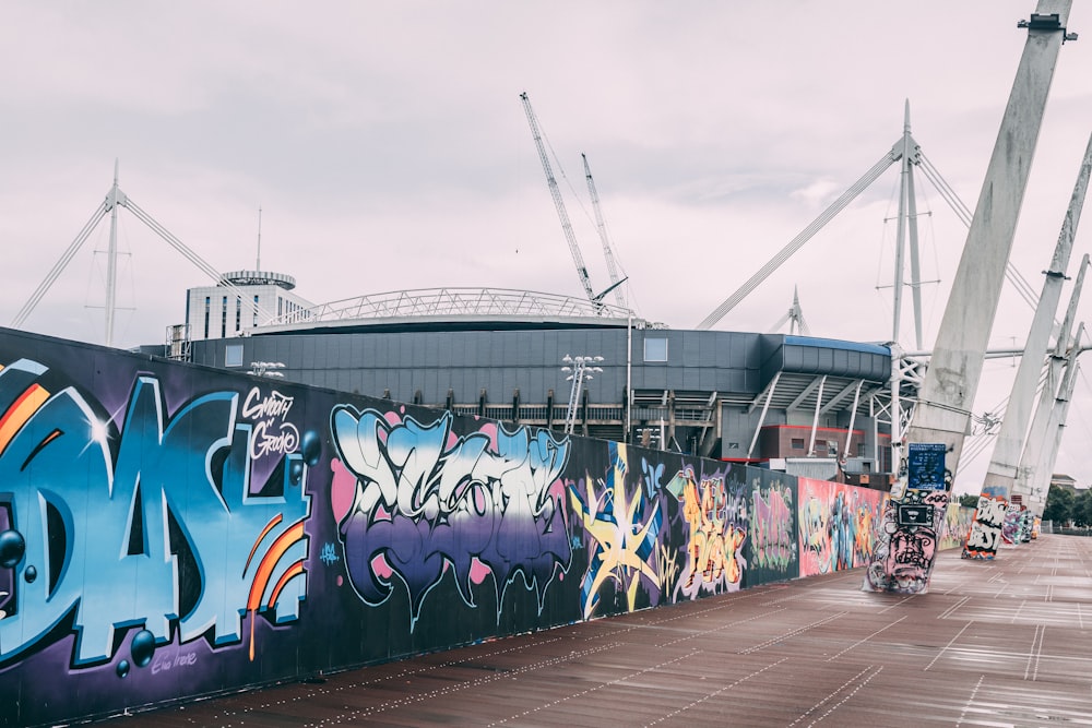 a large wall with graffiti