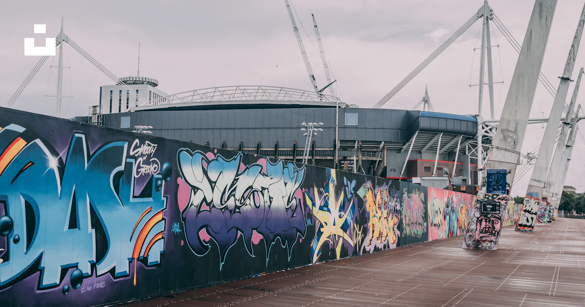 Graphiti Cardiff A large wall with graffiti photo – Free Cardiff stadium Image on Unsplash