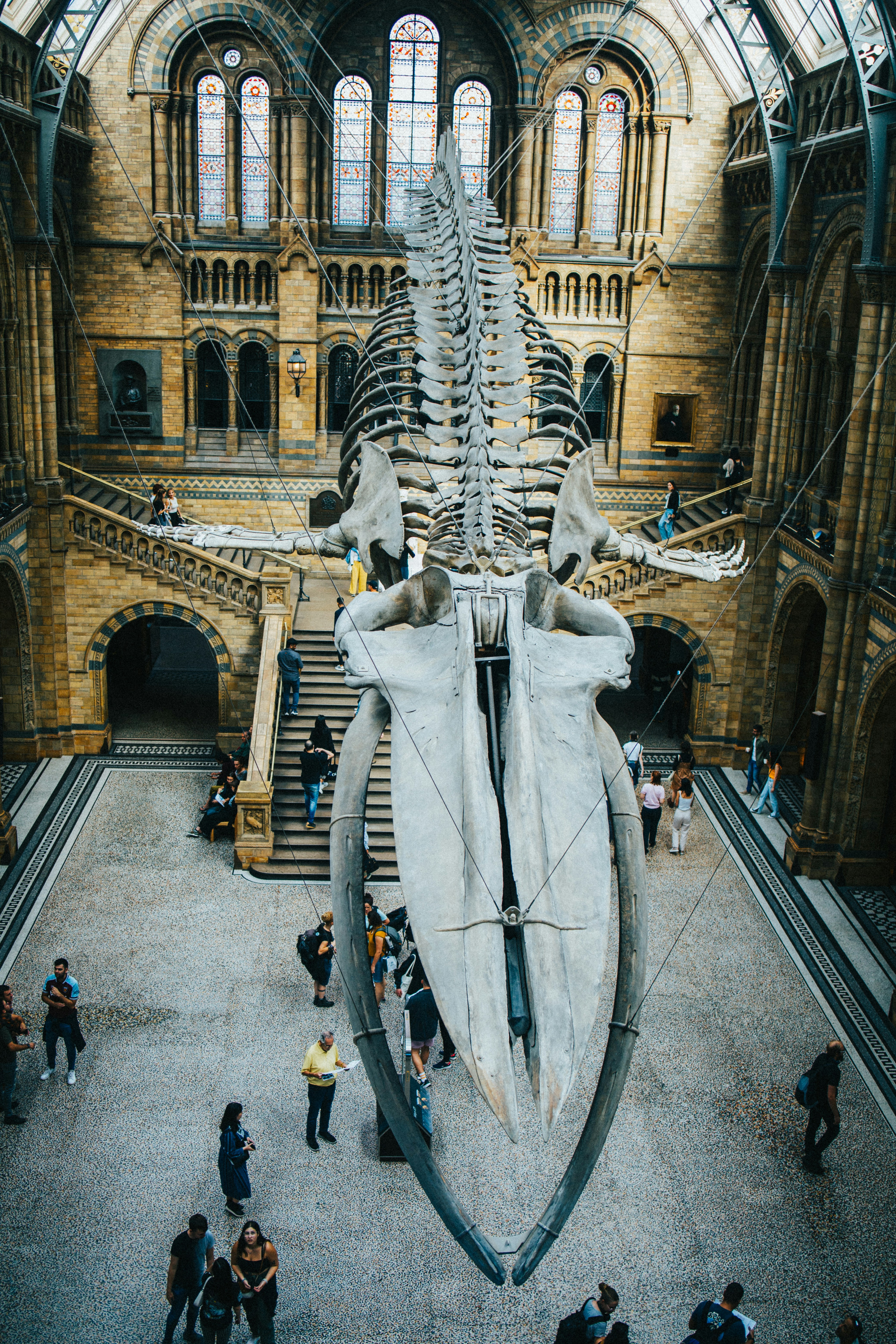 a large ornate building with a large statue in the middle