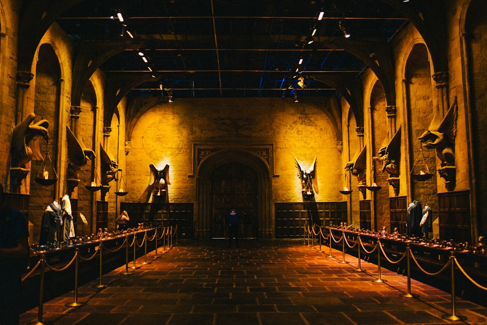 a large room with statues