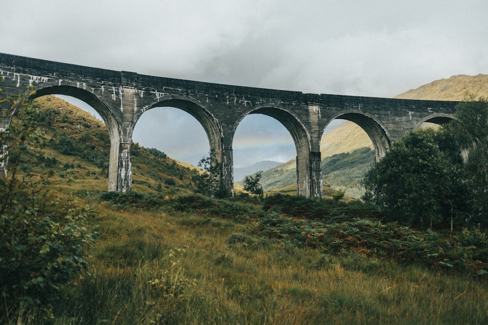 a large stone bridge with Tunkhannock Viaduct in the background