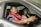 a man and woman in a car