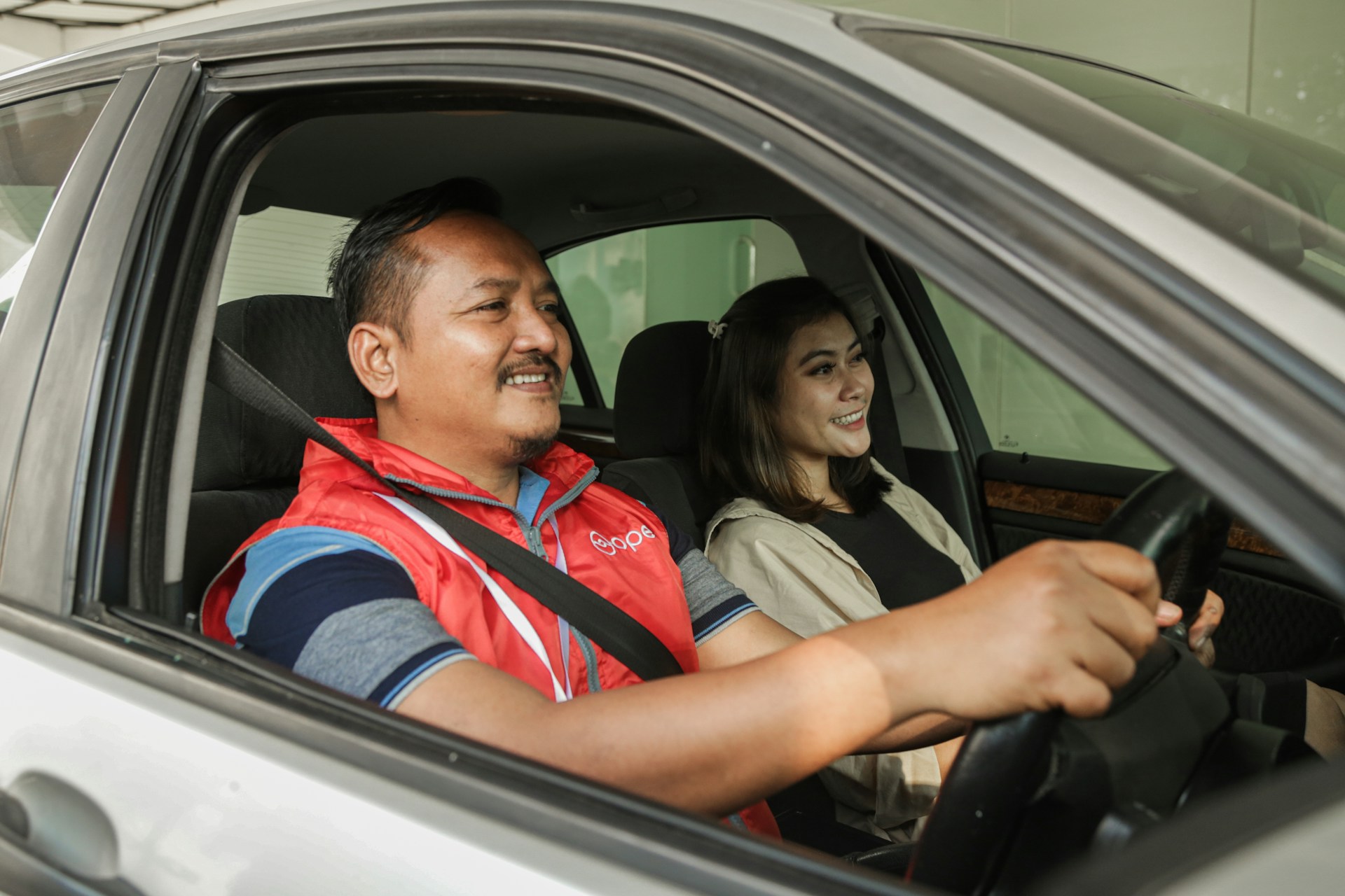 a man and woman in a car