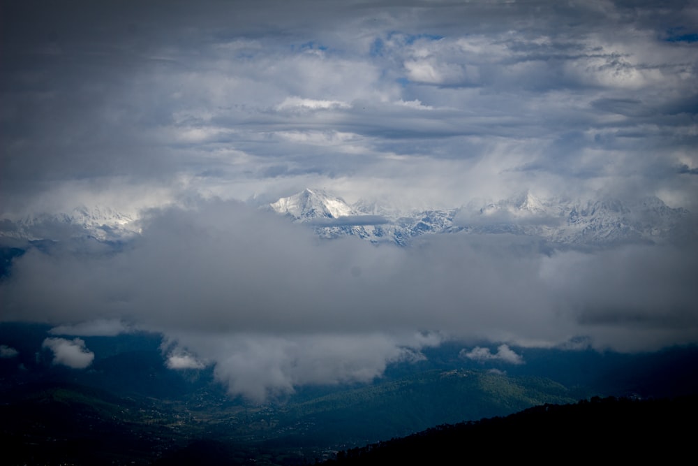 a mountain with clouds