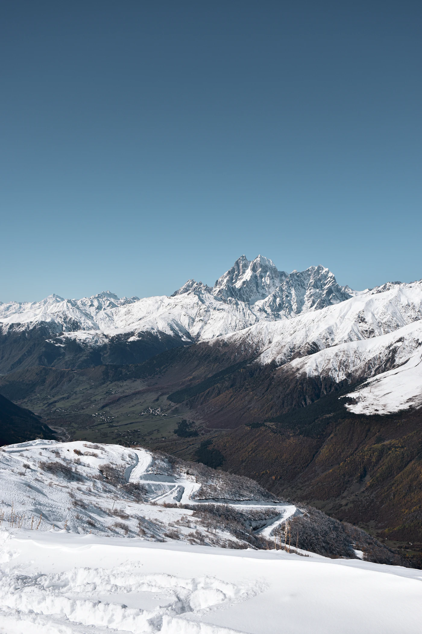 Snow-covered Caucasus peaks above Mestia in winter