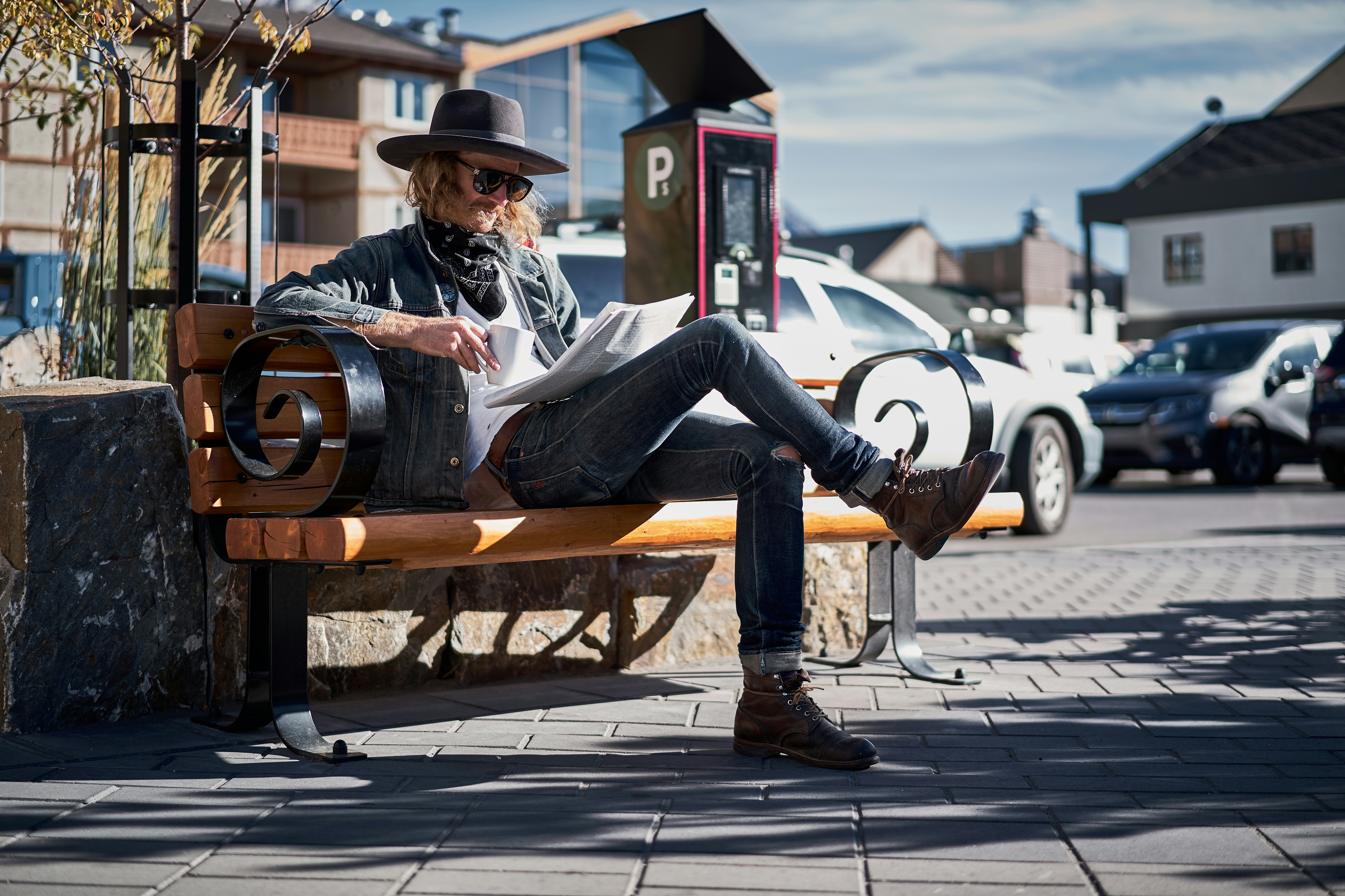 a man sitting on a bench