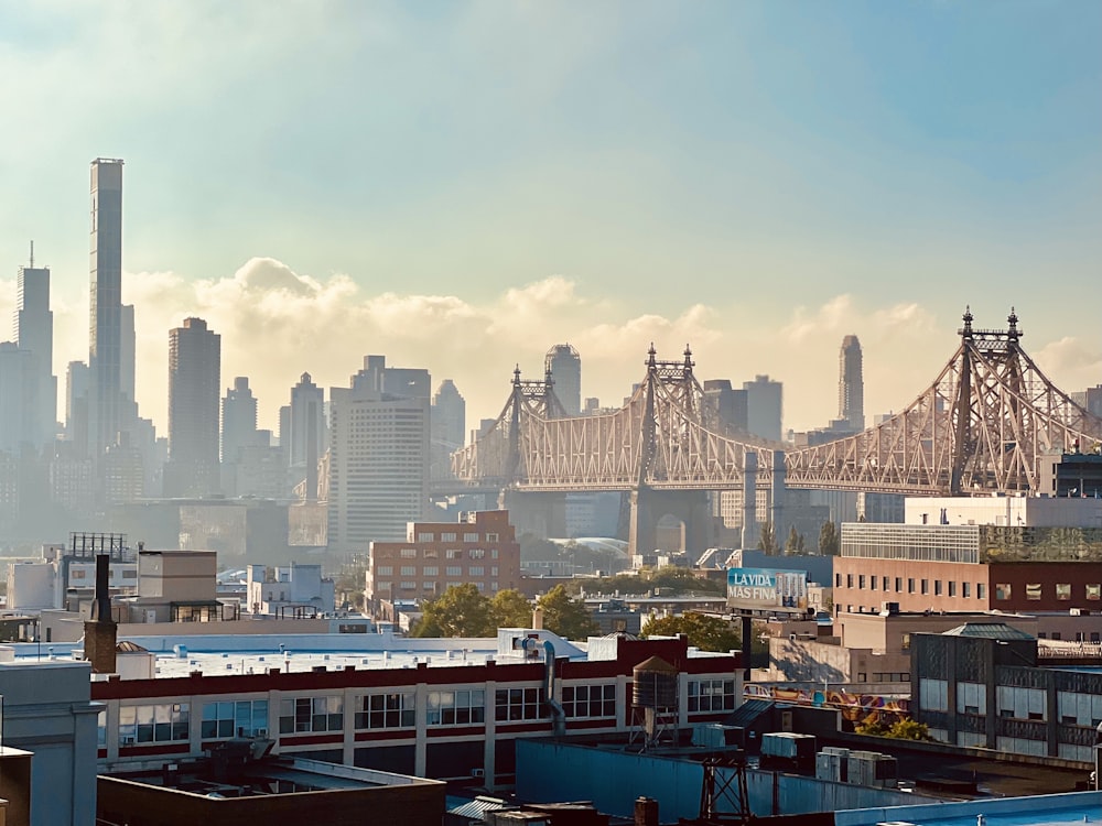 a city with a bridge and buildings