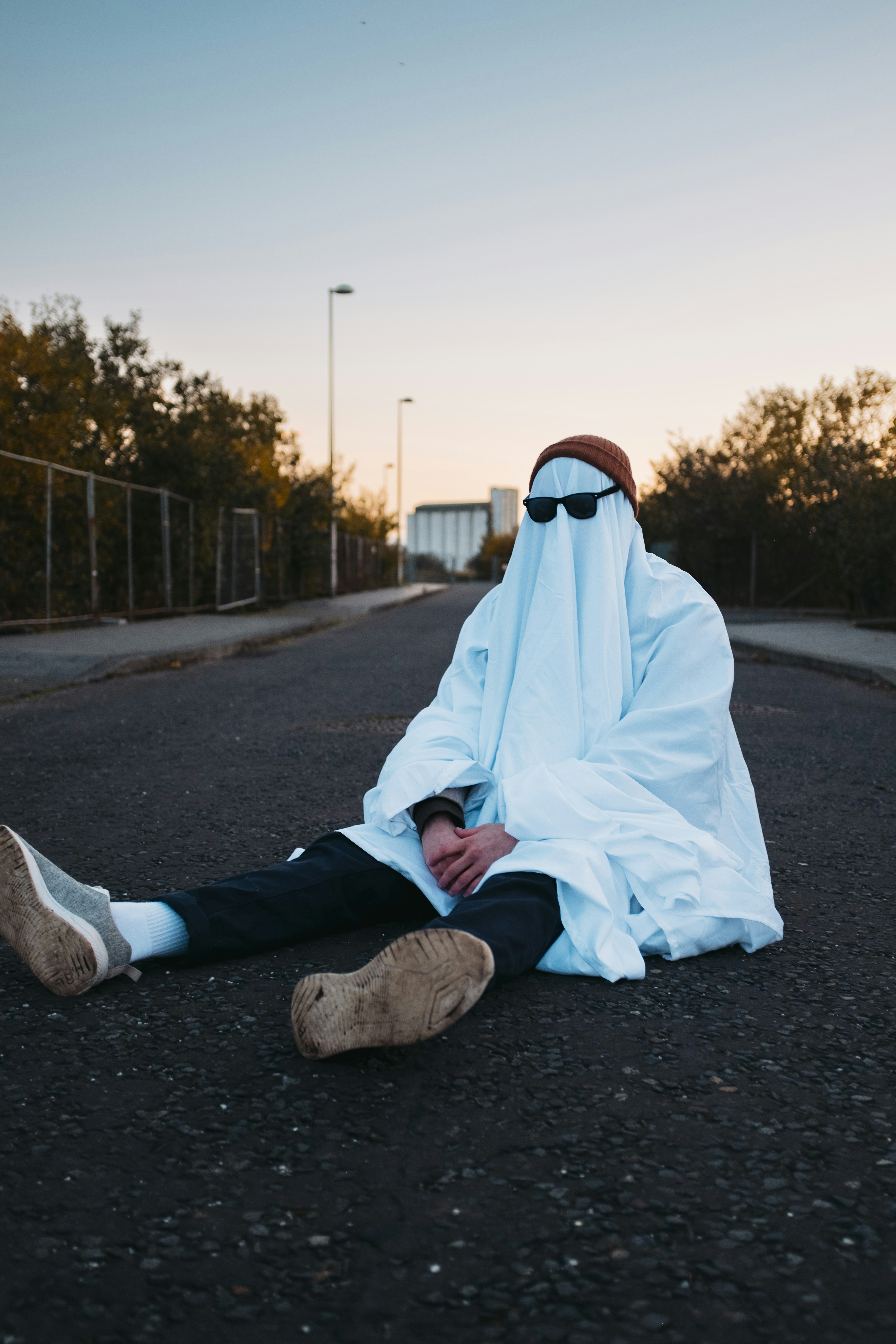 a person in a garment lying on the ground