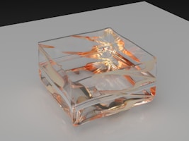 A unique liquid paperweight featuring vibrant colors and an embedded logo on a company conference table.