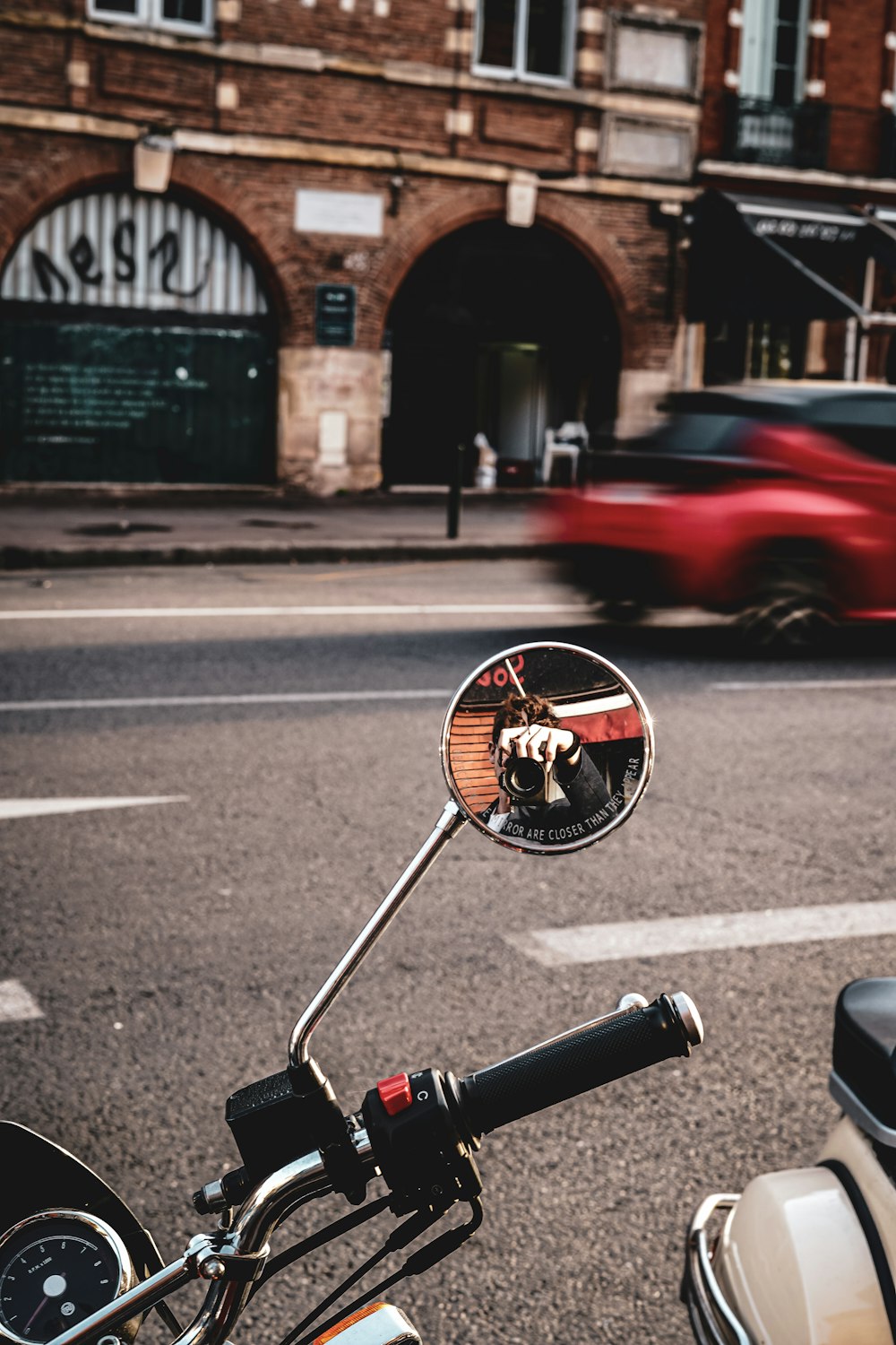 a motorcycle is parked on the side of a street