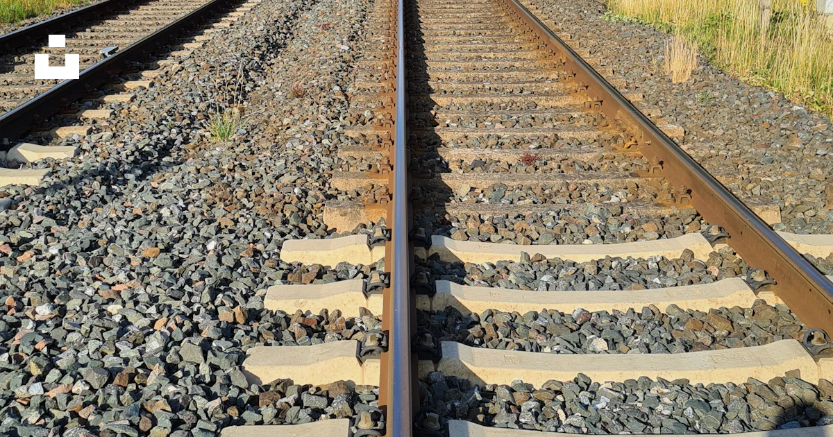Train tracks with rocks and trees photo โ Free Kulmbach Image on Unsplash