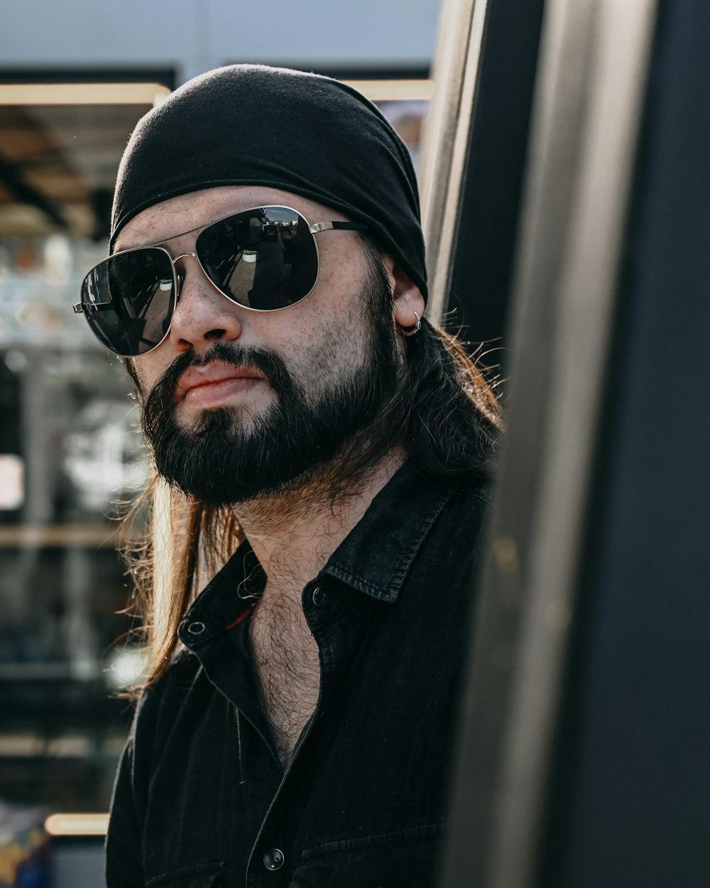 a man with a beard and sunglasses