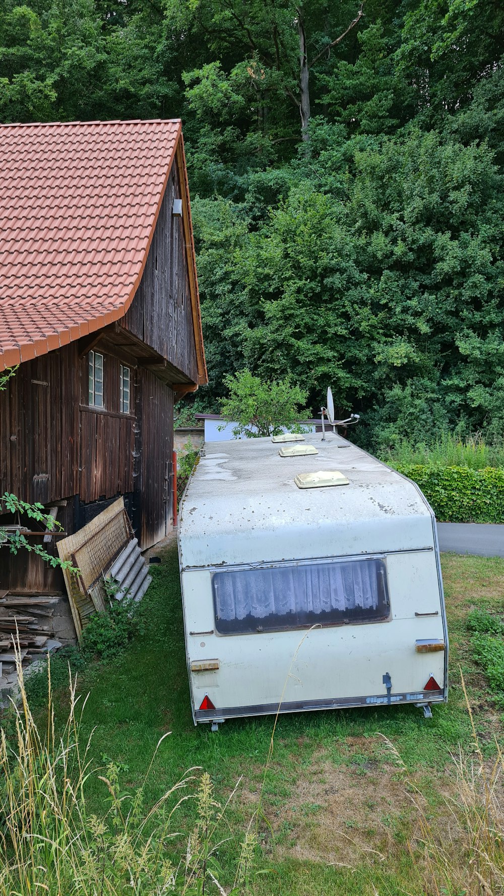 a trailer parked outside a house