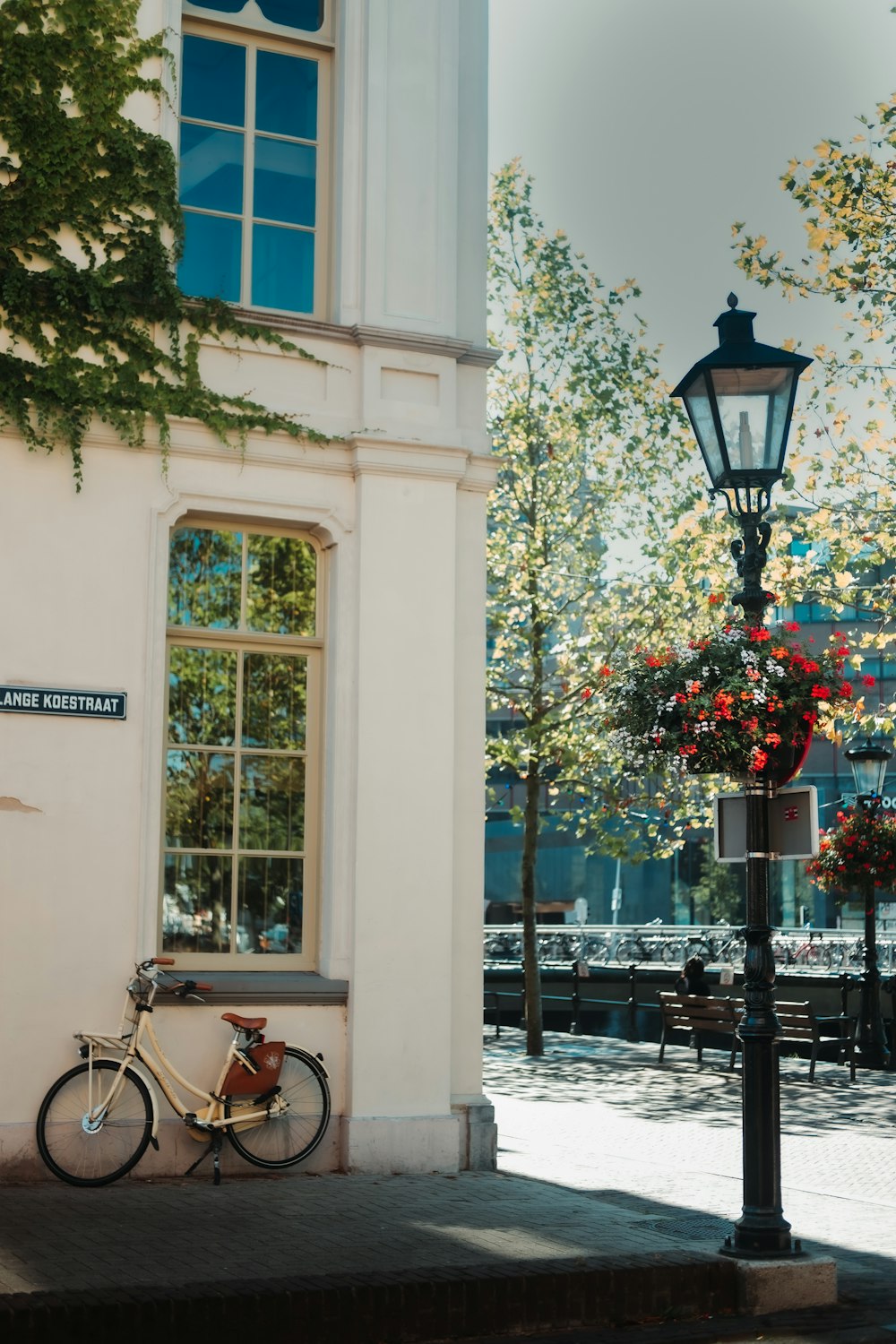 a bicycle parked on the side of a street