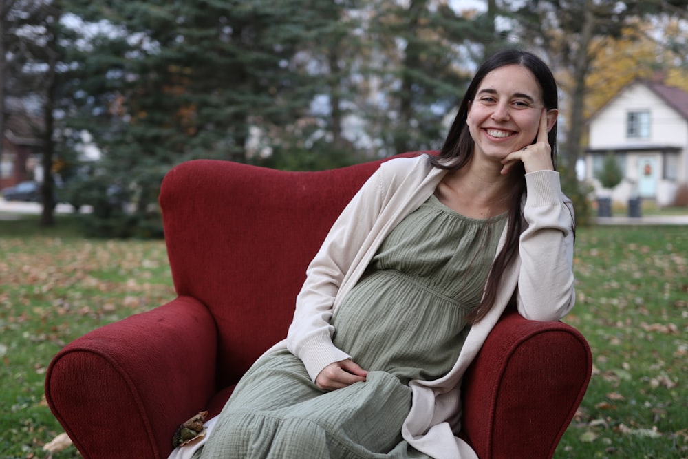 a person sitting on a red chair