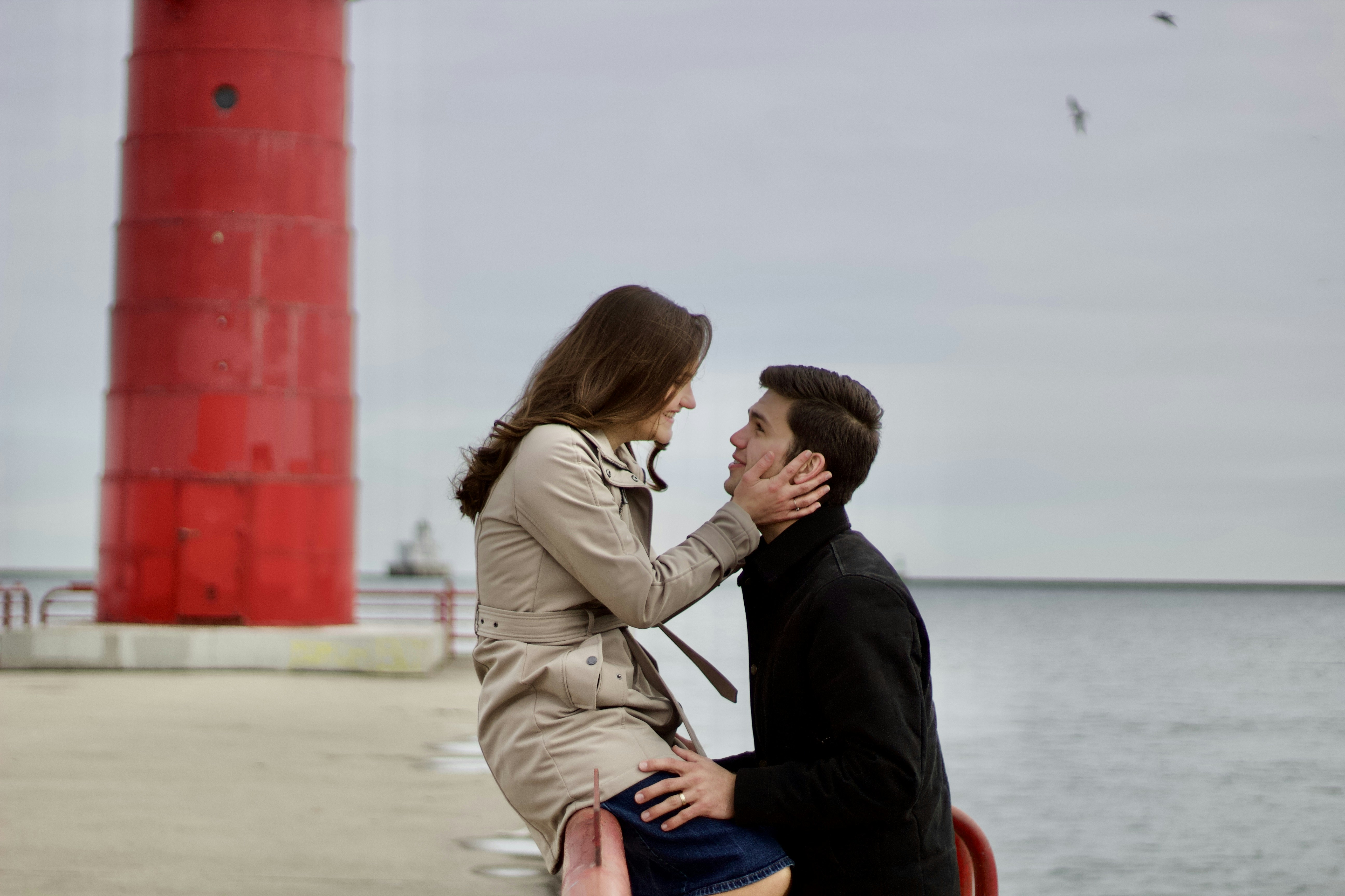 a man and woman kissing