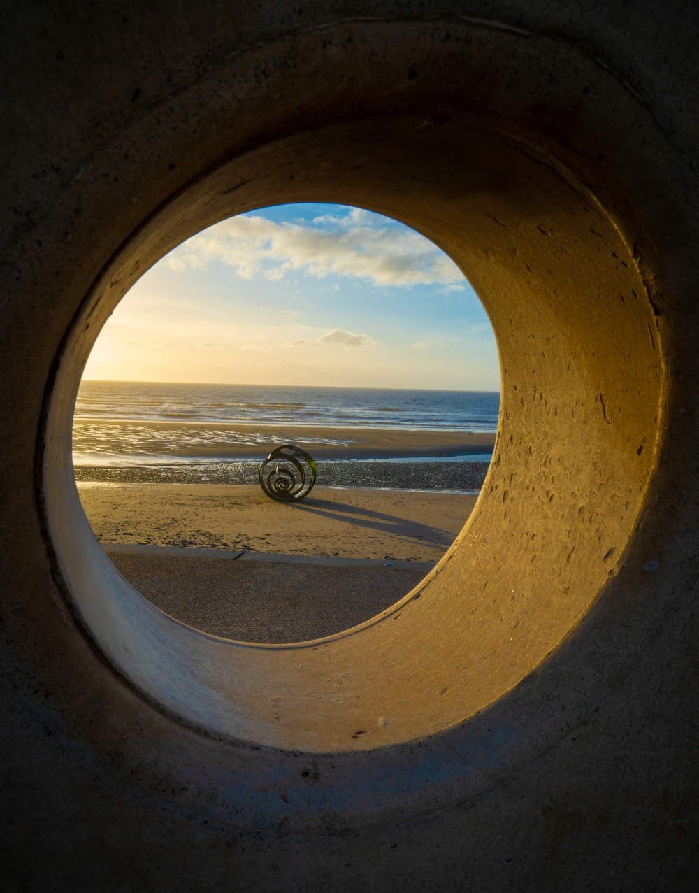 a view of the ocean through a window