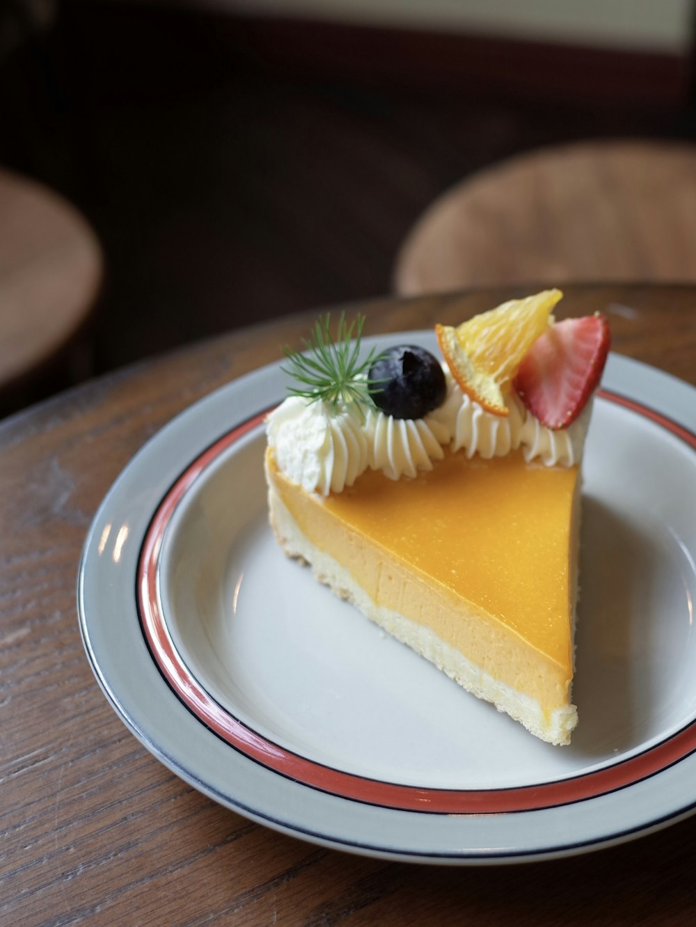 a slice of cake with fruit on top