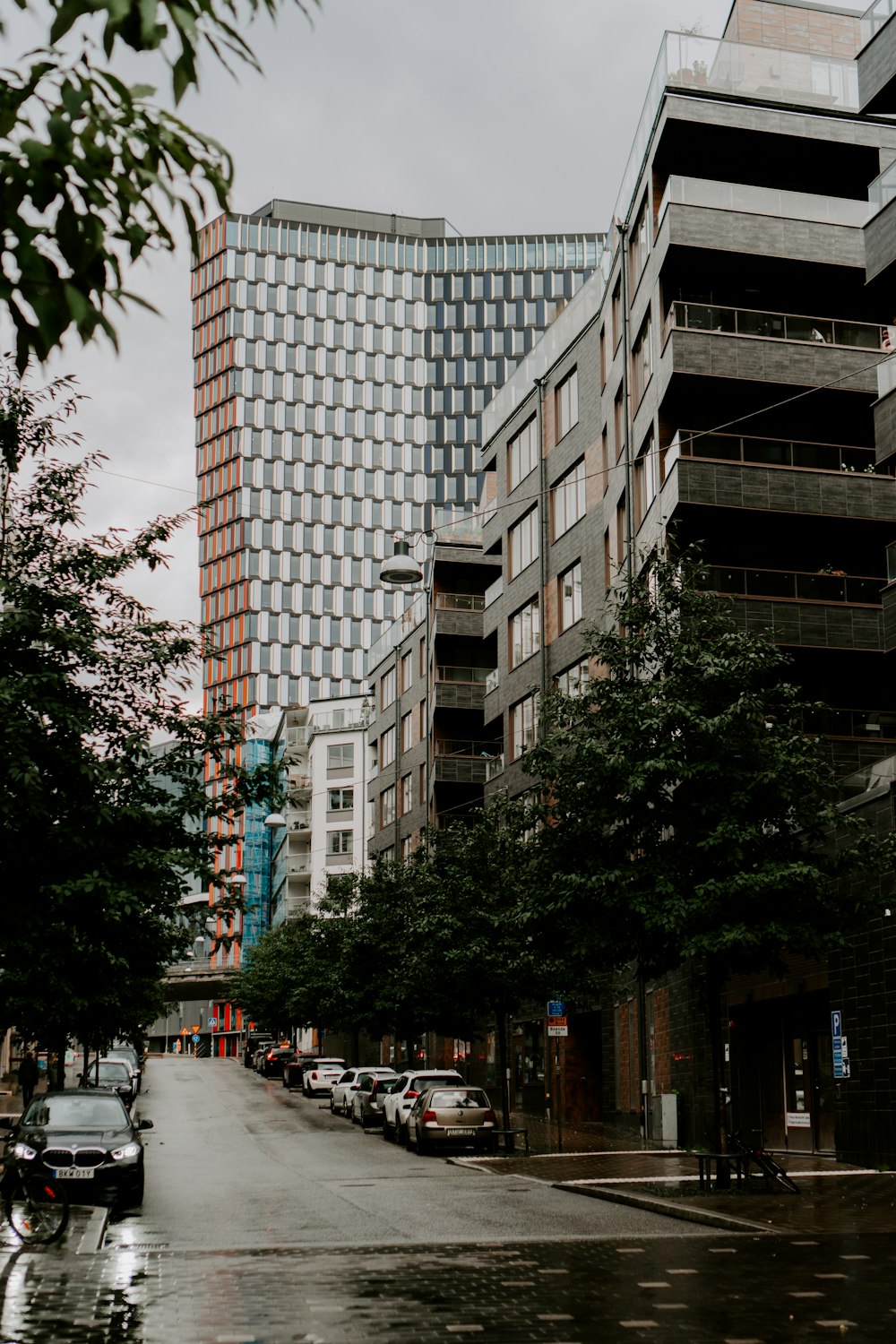 a street with cars and buildings on either side of it