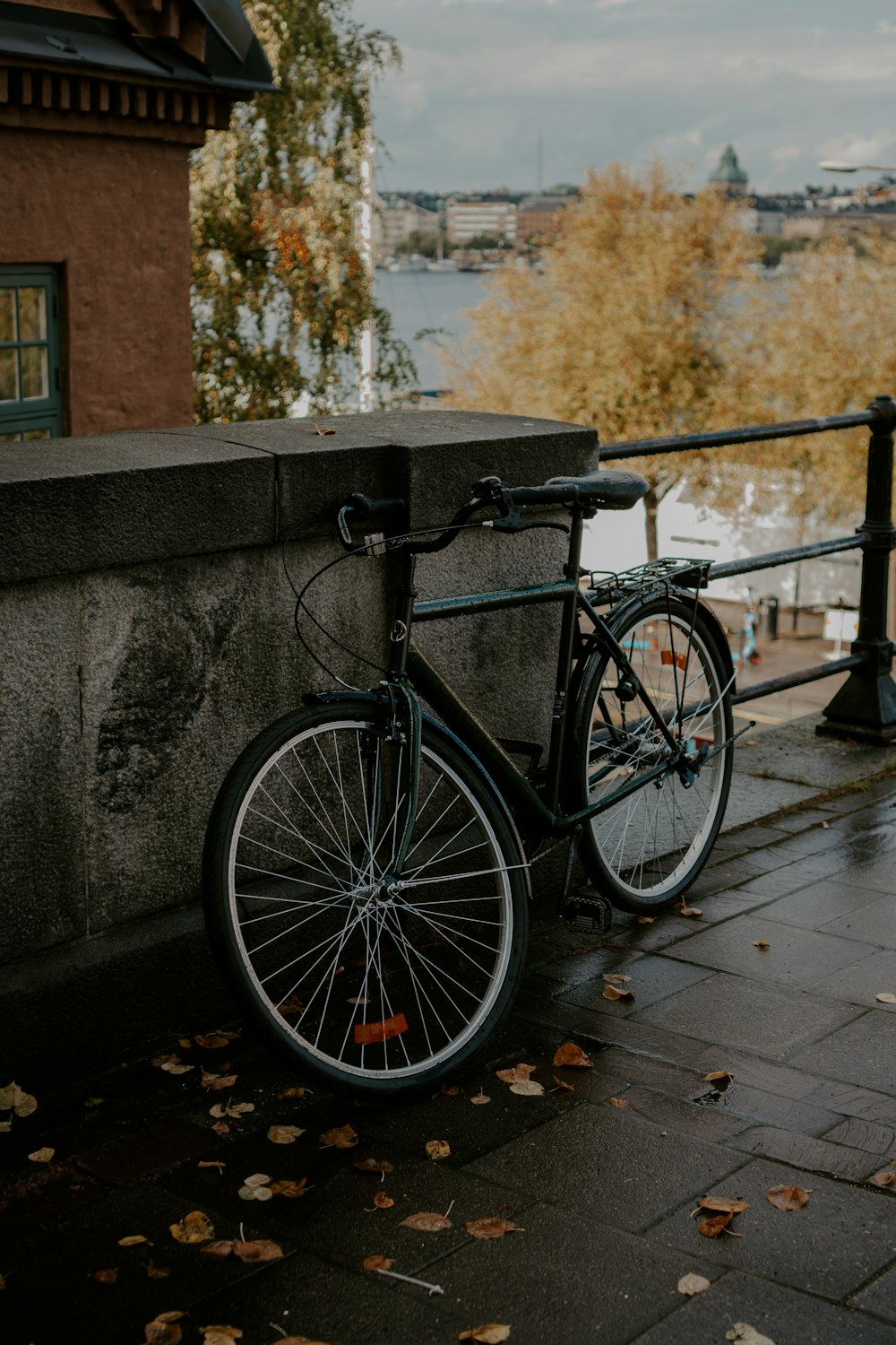 a bicycle parked on a railing